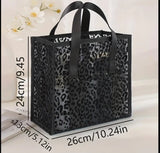 Black leopard mesh tote